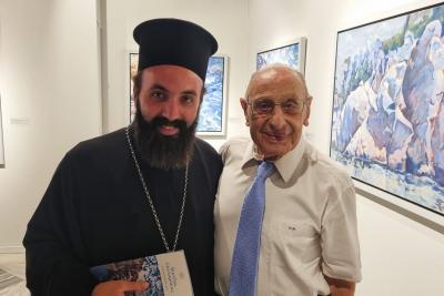 Στην έκθεση  "Γλαυκή Θάλασσα", ο Πρωτοσύγκελλος Αρχ. Ν. Δαρδανός εκπροσωπώντας τον Μητροπολίτη Ύδρας κ. ΕΦΡΑΙΜ