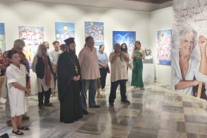 Στα εγκαίνια  της έκθεσης για τον Μάικλ Λόρενς στο ΙΑΜΥ, ο Πανοσ. Πρωτοσύγκελλος Αρχιμ. π. Νεκτάριος Δαρδανός